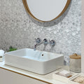 Gray glossy circular textured glass resin mosaic tile on bathroom wall