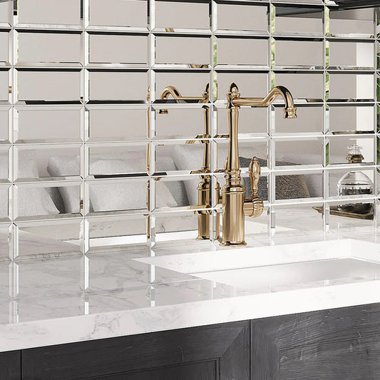 Polished clear silver glass subway tiles 3x6 with beveled edges installed as kitchen backsplash