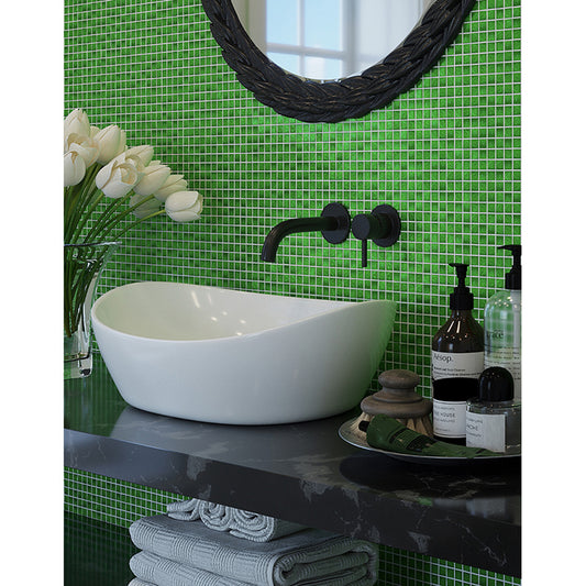 Glossy forest green glass mosaic square tiles, 12x12 inches, installed on bathroom wall 