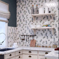 Gray beige matte hexagon recycled glass mosaic tiles on kitchen backsplash