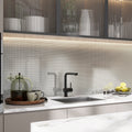 Metallic silver penny round porcelain mosaic tile glossy finish on kitchen backsplash