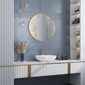 Denim blue matte penny round porcelain mosaic tile on bathroom wall