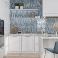 Glossy blue ceramic picket tiles with elongated hexagon shape on kitchen backsplash
