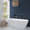 Blue 2x8 matte ceramic subway tile installed on bathroom wall