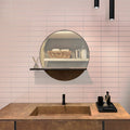 Pink glossy ceramic subway tile 2x8 inch installed on bathroom wall