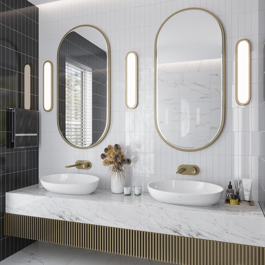 Glossy white 2x8 ceramic subway tiles installed vertically on bathroom wall