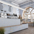 Light blue natural porcelain large format rectangular tiles with matte finish on wall and counter backsplash