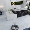 Light blue natural finish 24x24 square porcelain floor tiles with subtle gold accents