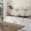 Light beige porcelain rectangular large format tiles with natural finish on kitchen backsplash and wall