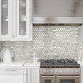 Soft white and beige polished marble hexagon mosaic tile backsplash in kitchen