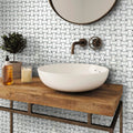 white polished basketweave marble mosaic tile on bathroom wall