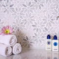 Polished Carrara grey and white marble floral mosaic tile, 10.7x12 inches, bathroom wall installation