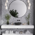 Gray and white polished floral marble mosaic tile on bathroom wall