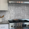 Polished gray octagon marble mosaic tile backsplash in kitchen setting
