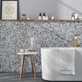 White gray polished penny round marble mosaic tile on bathroom wall