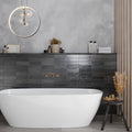 Black ceramic bullnose tile trim, matte and glossy finish, 1x8 inch, installed on bathroom wall