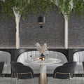 Black textured porcelain large format tile on accent wall in living space