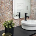 Beige polished square mother of pearl mosaic tile on bathroom backsplash