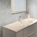 Polished white natural shell mosaic tile with fishscale pattern on bathroom wall