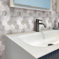 Beige polished hexagon marble mosaic tiles on bathroom backsplash
