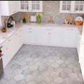 Grey honed hexagon marble tiles with wooden texture finish installed on kitchen floor