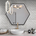 Polished gray and white glass marble mosaic basketweave tile on bathroom wall