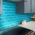 Sapphire blue 3x6 matte glass subway tile backsplash in kitchen wall