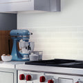 White matte glass subway tile 3x6 inch on kitchen backsplash