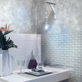 Gray glossy glass subway mosaic tile backsplash on kitchen area