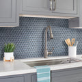 Coin gray glossy penny round glass mosaic tile backsplash in kitchen setting