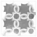 Polished floral marble mosaic tile in soft white and smoky gray with circular and cross patterns