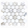 Polished white gray hexagon Calacatta gold marble mosaic tile sheet with soft gray veining and golden tones