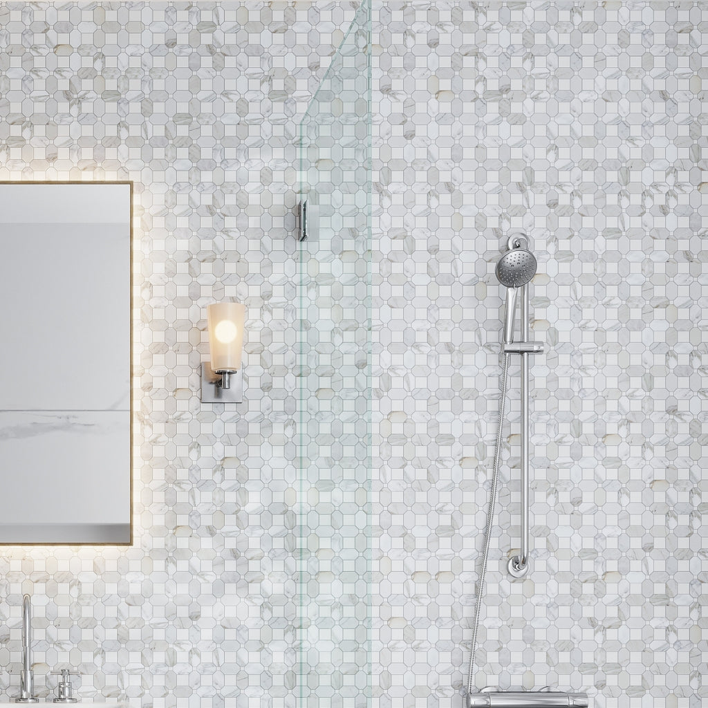 White gray polished octagon and dot calacatta gold Thassos mosaic tile wall with subtle marble veining