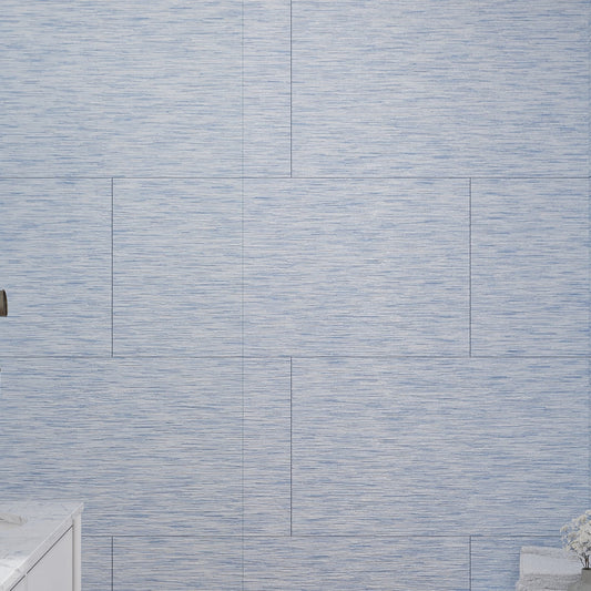 blue textured 24x48 inch large format porcelain tile with a subtle linear pattern