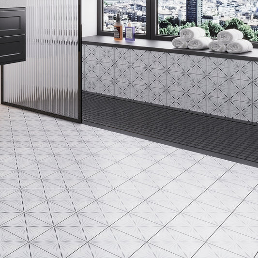 white 12x12 honed dolomite tile with black starburst pattern in ice grey finish floor and wall installation