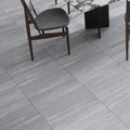 light gray 24x24 matte porcelain tile with subtle stone veining and smooth finish
