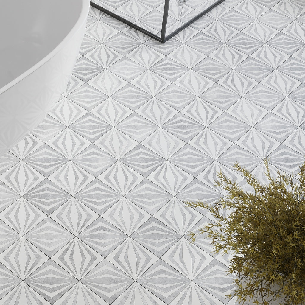 Dolomite ice grey 12x12 honed geometric starburst mosaic floor tile with soft grey and white tones