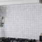 Light gray matte porcelain mosaic tile with stone look in 12x12 squares for wall and floor