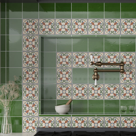 deep forest green 6x6 glossy porcelain tile with floral border pattern in kitchen backsplash