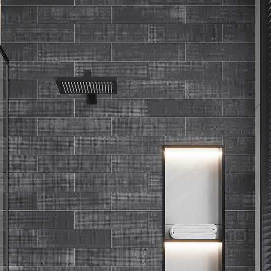 dark gray eastern black 3x12 textured etched dot elongated subway tile with subtle dot pattern
