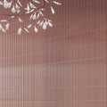red glossy 2x8 ceramic subway tile with vertical fluted texture on wall
