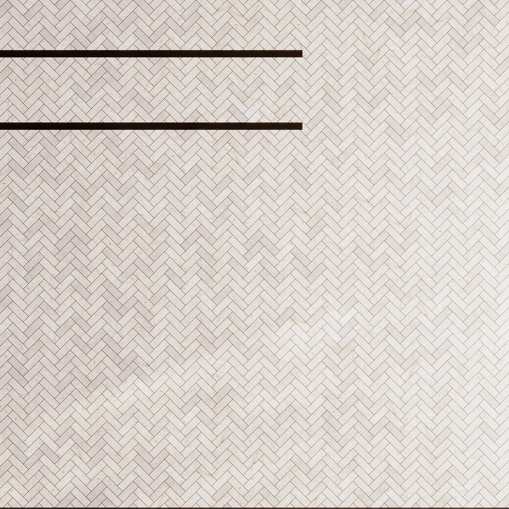 Ivory beige 12x12 polished Crema Marfil marble tiles in herringbone mosaic pattern