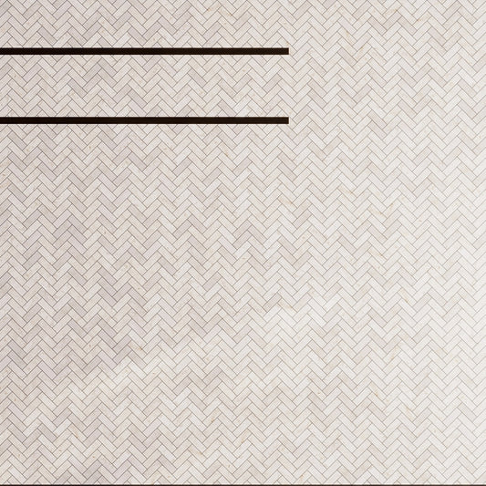 Ivory beige 12x12 polished Crema Marfil marble tiles in herringbone mosaic pattern