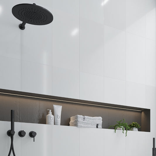 White 12x24 polished Thassos marble tile wall with high-sheen finish and clean, crisp white color