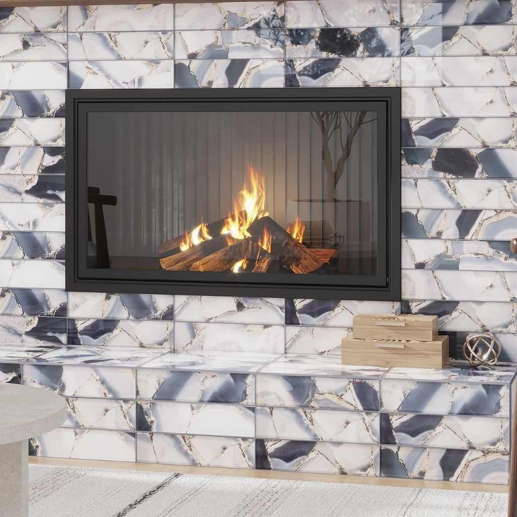 glossy gray glass subway tile with gold flecks in 3x12 size arranged on wall and bench