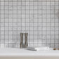 white honed 12x12 carrara marble mosaic tile with subtle gray veining in square pattern