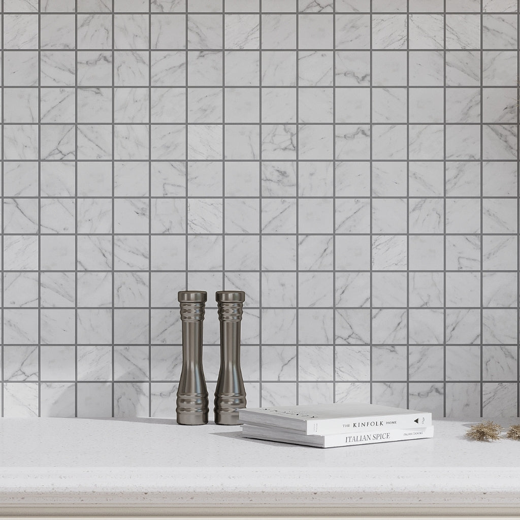 white honed 12x12 carrara marble mosaic tile with subtle gray veining in square pattern