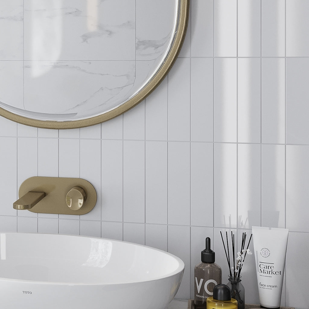 Glossy white 2x8 ceramic subway tile wall with vertical stacking pattern