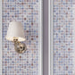 Glossy 12x12 manatee blue glass mosaic tile with swirling light blue and muted accents