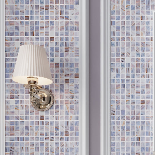Glossy 12x12 manatee blue glass mosaic tile with swirling light blue and muted accents